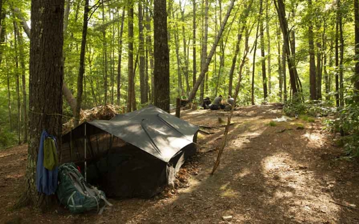 a campsite in the woods of the blue ridge mountains on a gap year course with outward bound